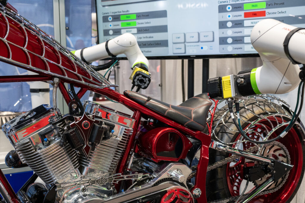 Robots inspecting a motorcycle